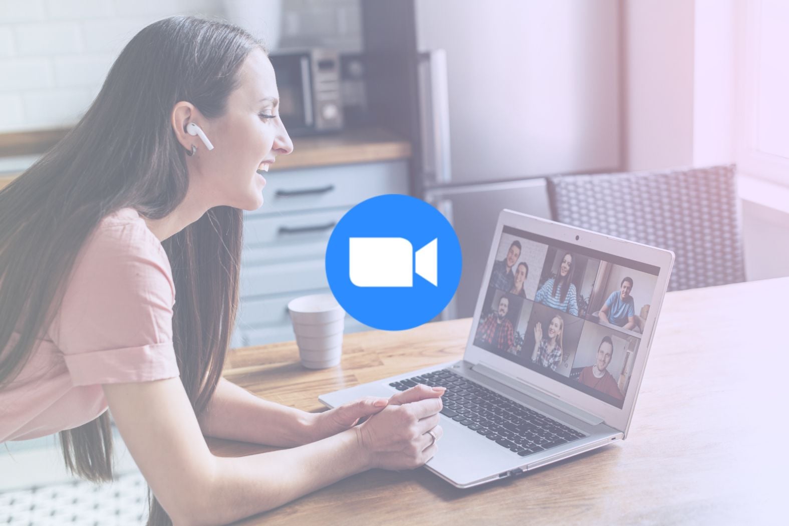 Zoom logo with zoom meeting in the background