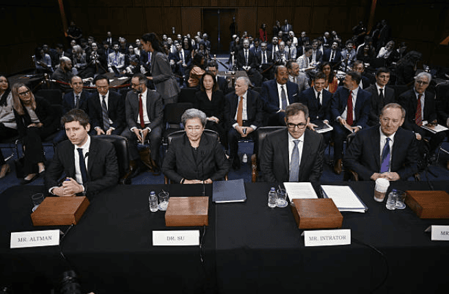 The source image used for the analysis test, showing Sam Altman and Lisa Su in a crowded U.S. Senate hearing.